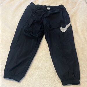 Nike Black Track Pants with Relaxed Fit and Elastic Cuffs